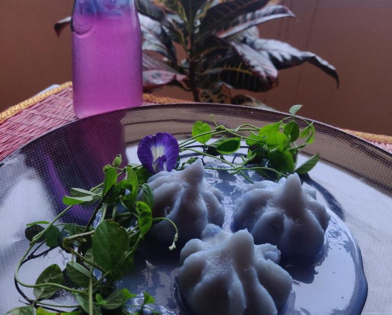 Thai inspired Bluepea flower sticky jasmine rice Modak with coconut cream sauce